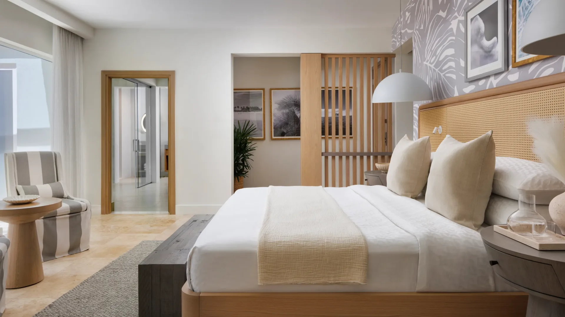 Bamboo Palm Room with balcony tranquility soaking tub and king bed at Sandals St. Vincent and the Grenadines.