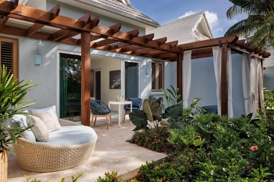 Garden Butler Suite patio seating and pergola at Sandals St. Vincent and the Grenadines.