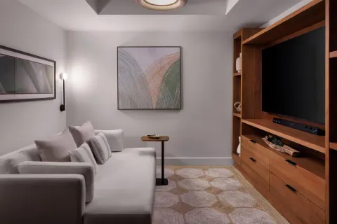 Media room lounge in the Lady Palm Club Suite at Sandals St. Vincent and the Grenadines.