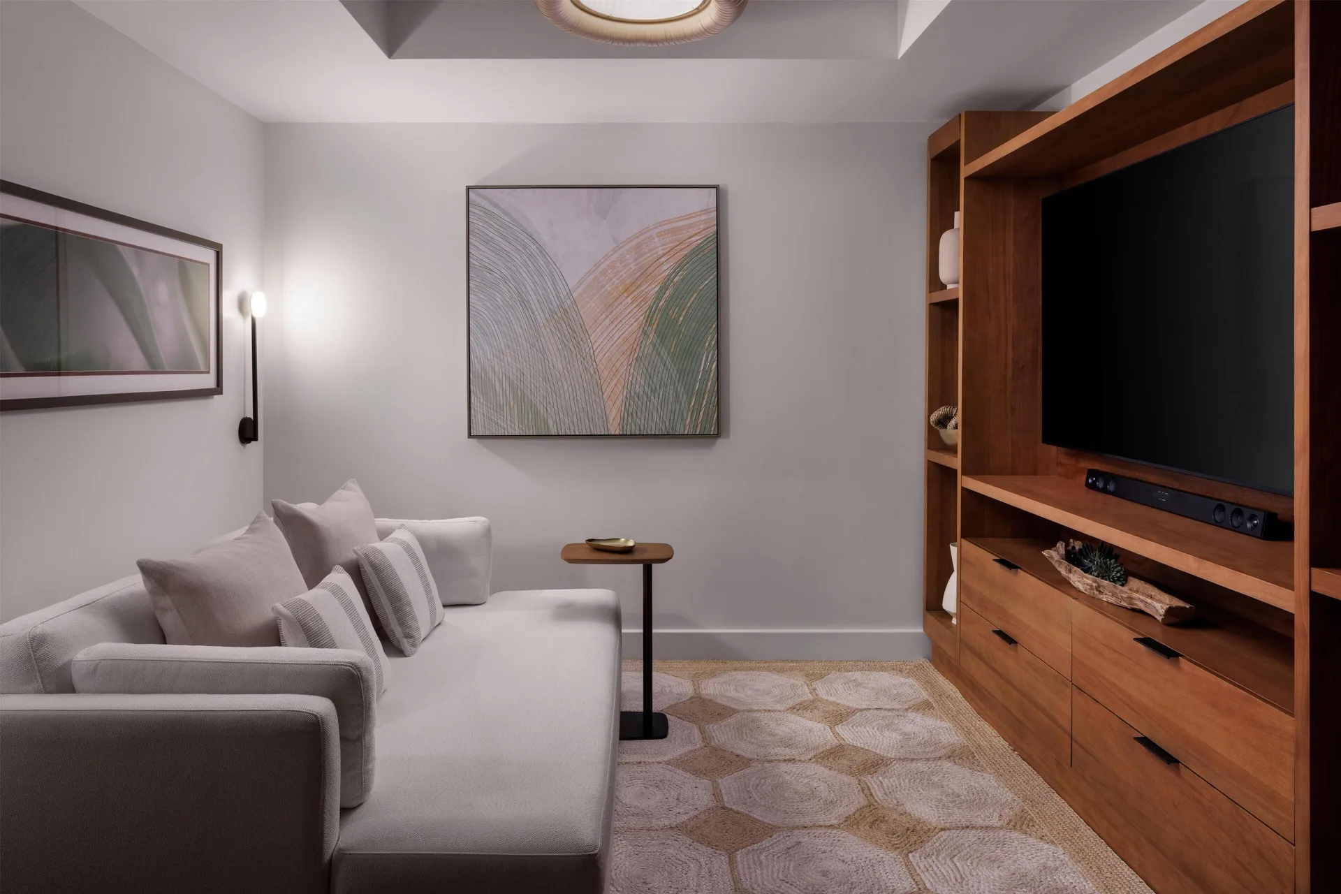 Media room lounge in the Lady Palm Club Suite at Sandals St. Vincent and the Grenadines.