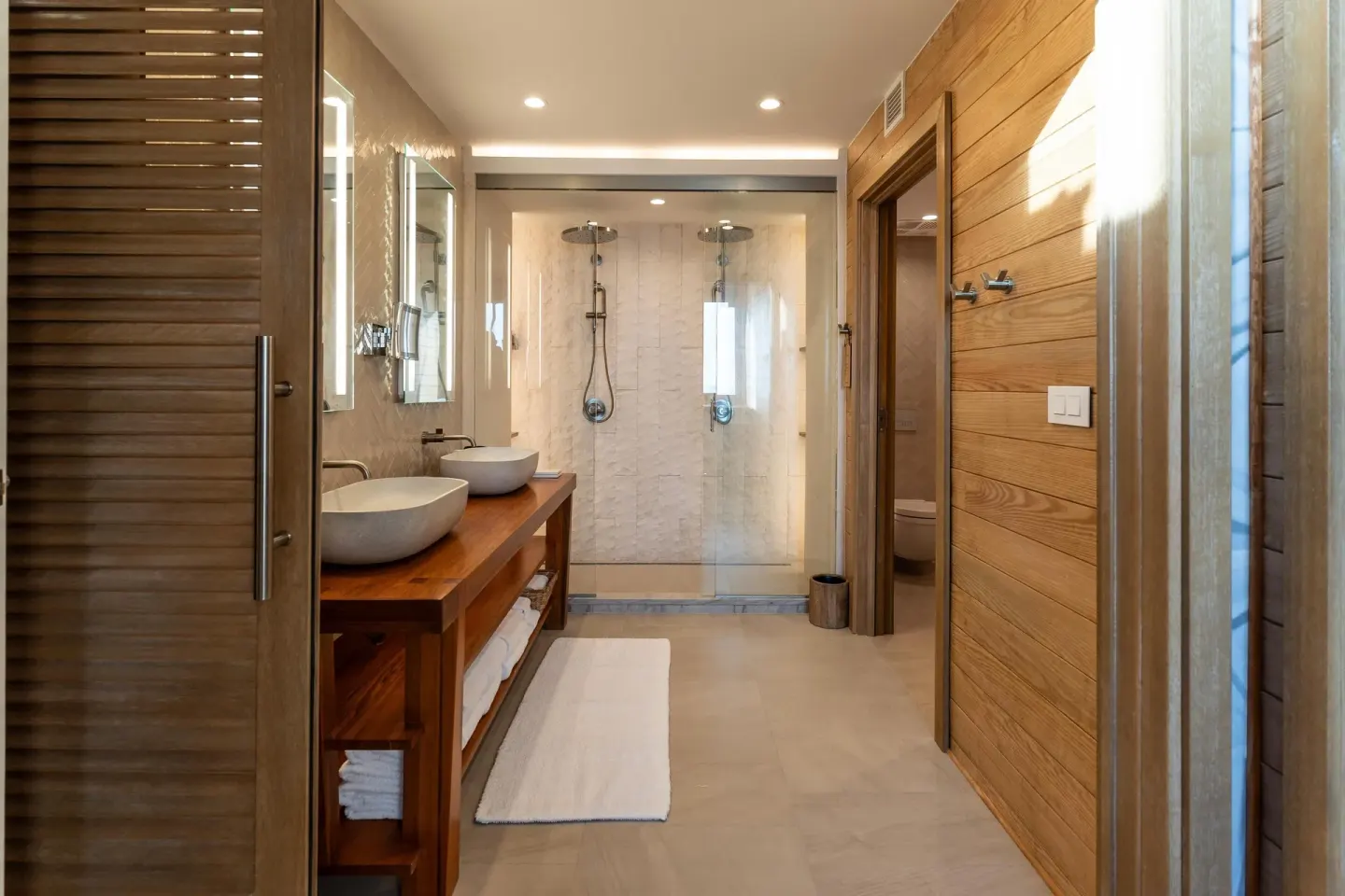 Vincy Overwater Two-Story Villa bathroom with double vanity at Sandals St. Vincent and the Grenadines.