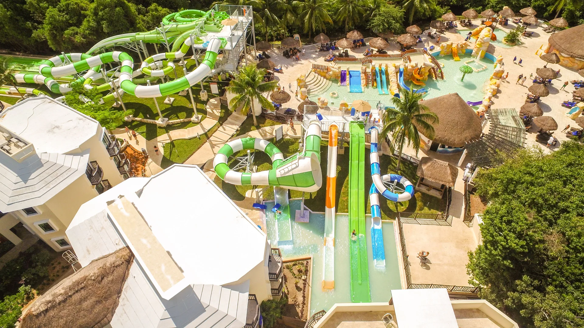 Aerial view of the water park slides and pools at Sandos Caracol Nature Resort & Water Park.