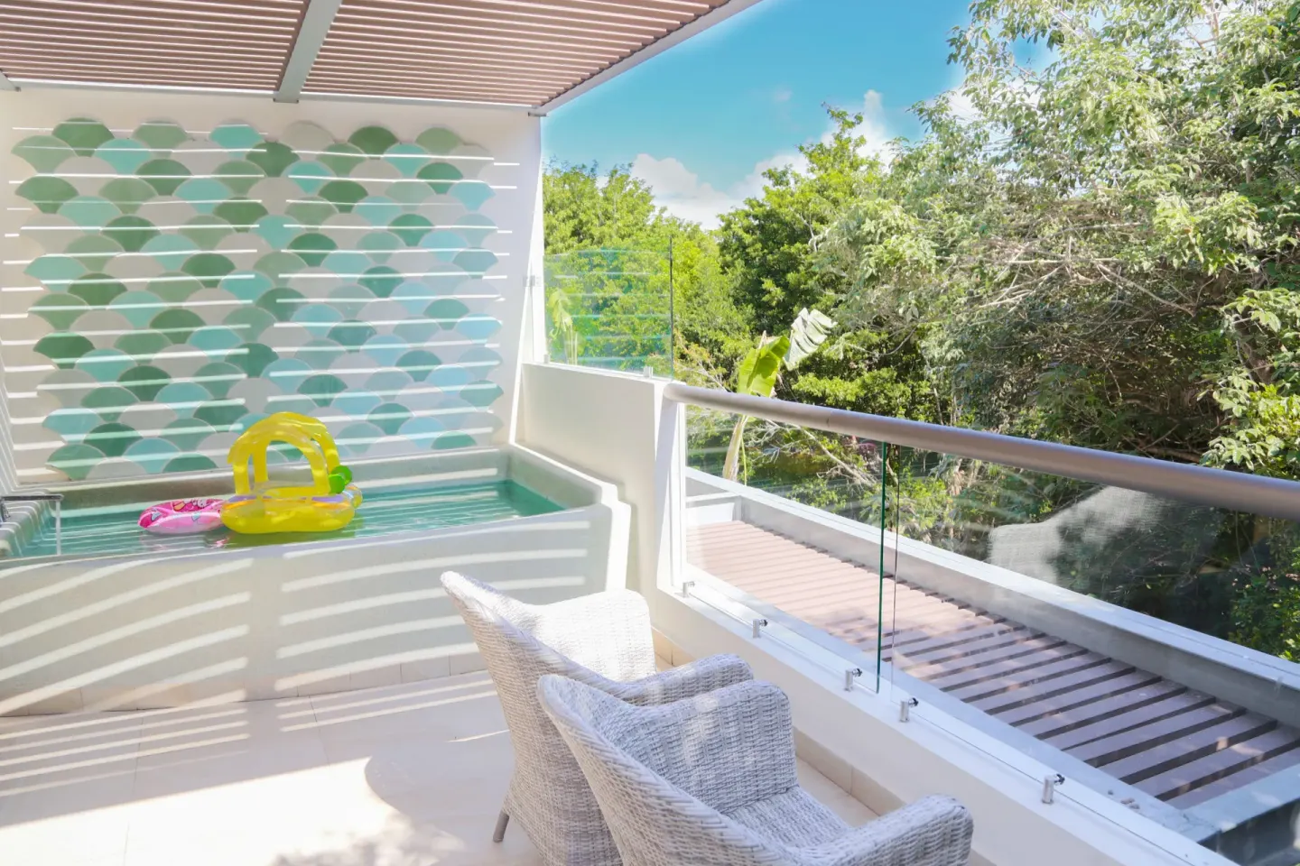 Eco Junior Suite balcony with plunge tub at Sandos Caracol Nature Resort & Water Park.