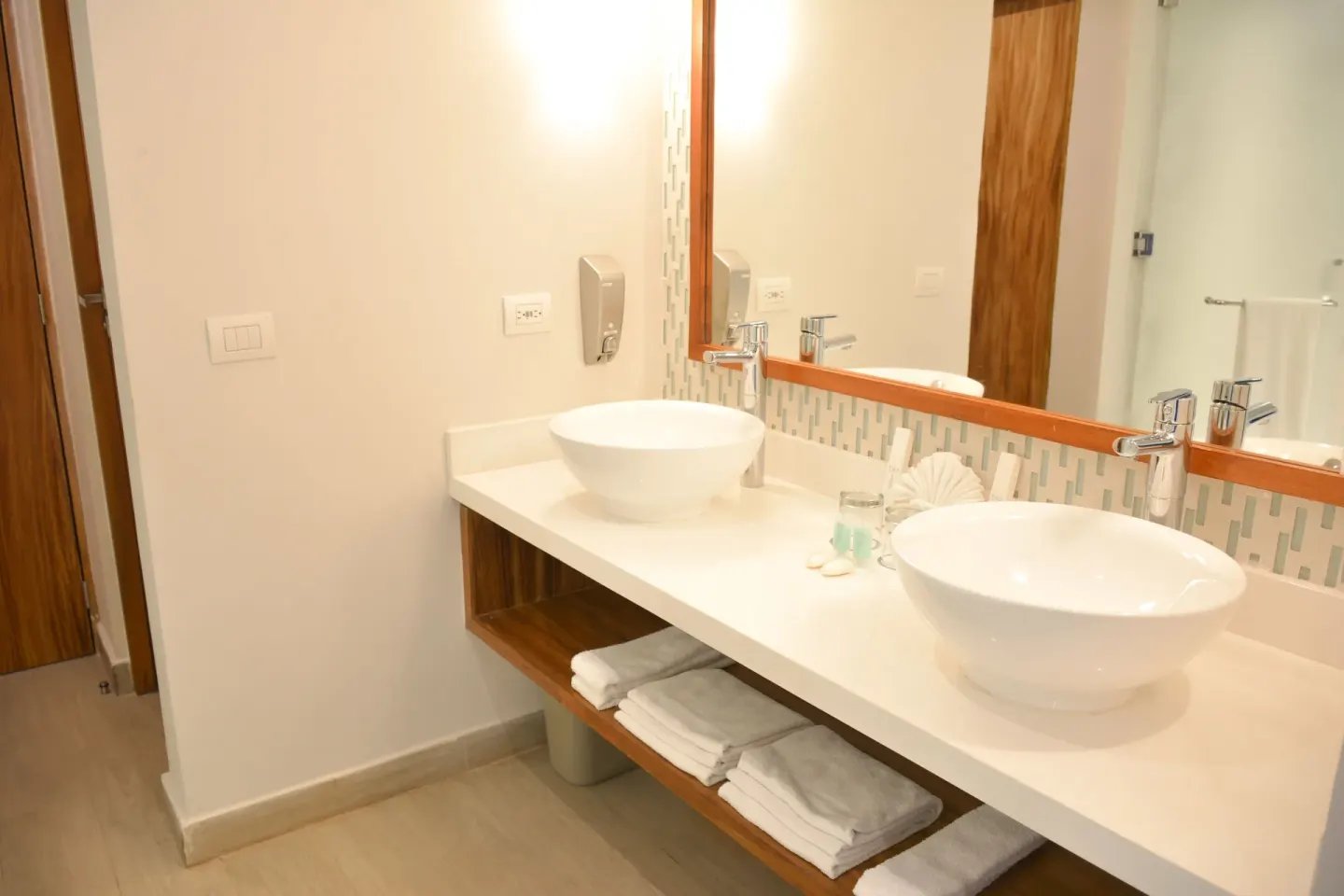 Eco Junior Suite double vanity bathroom at Sandos Caracol Nature Resort & Water Park.
