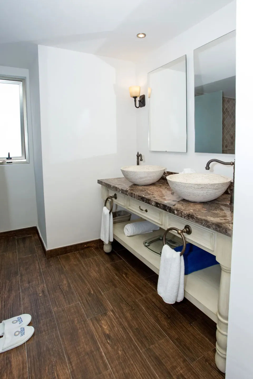 Casita Suite bathroom vanity with two vessel sinks at Sandos Finisterra.