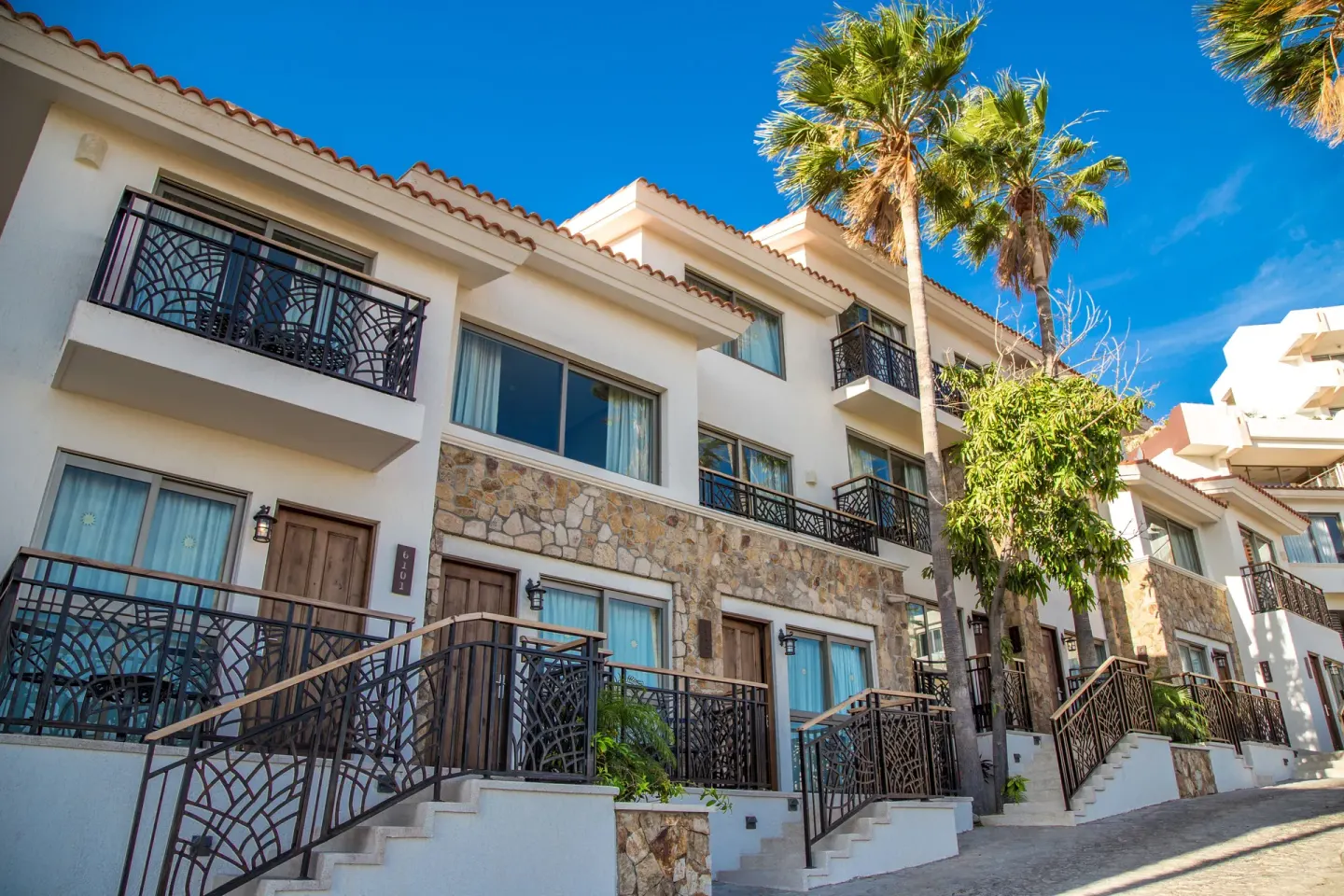 Casita Suite exterior balconies and stairways at Sandos Finisterra.