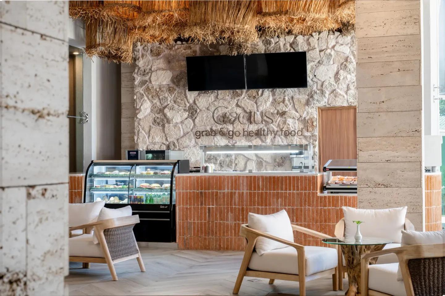 Cactus cafe counter and lounge seating at Seadust Cancún Family Resort.