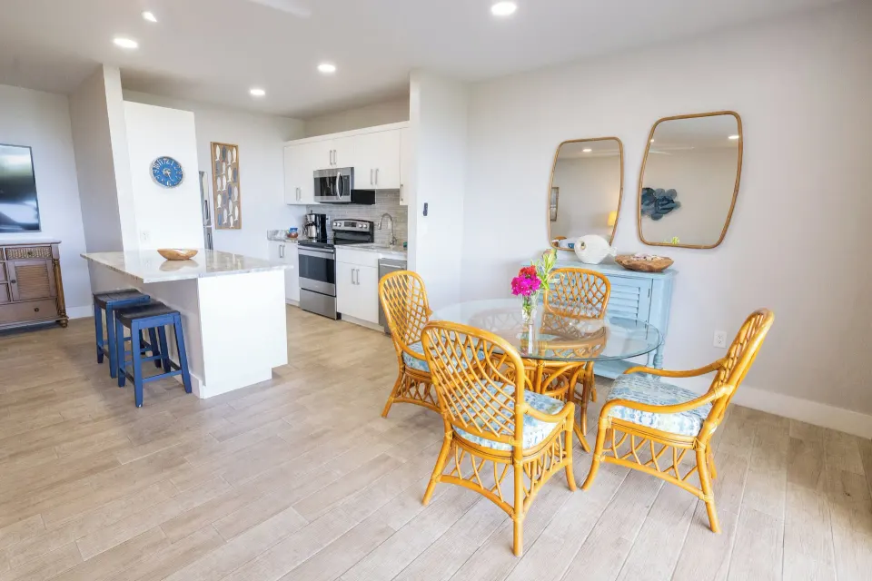 Hillside two-bedroom condo dining area and kitchen at Secret Harbour Beach Resort.