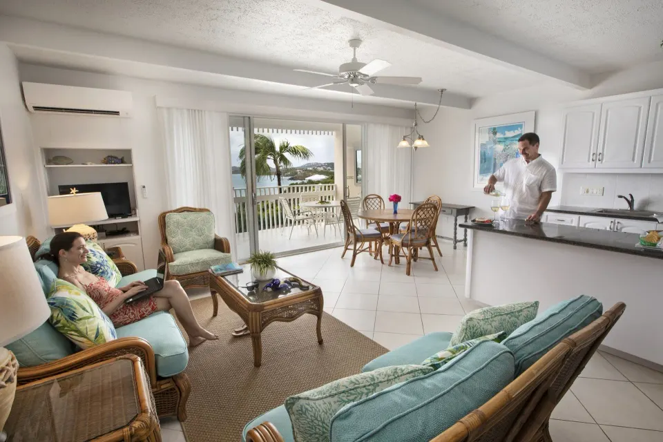 Open living, dining, and kitchen area in a hillside condo at Secret Harbour Beach Resort.