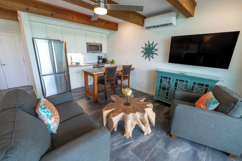 Beachfront Studio Suite living room and kitchen at Secret Harbour Beach Resort.