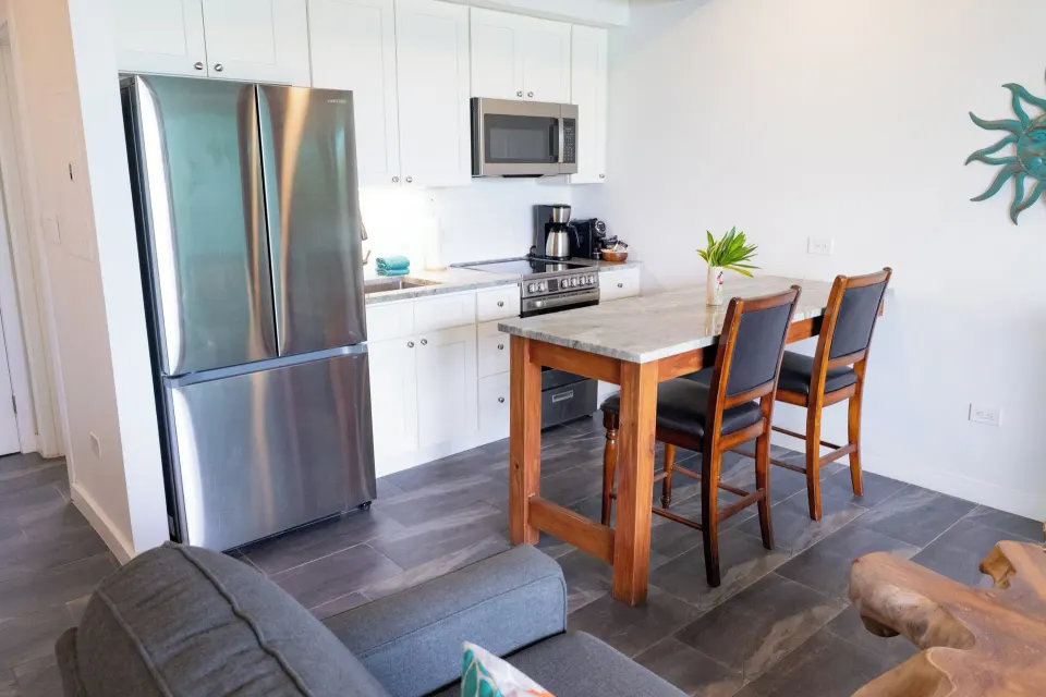 Beachfront Studio Suite kitchen and dining counter at Secret Harbour Beach Resort.