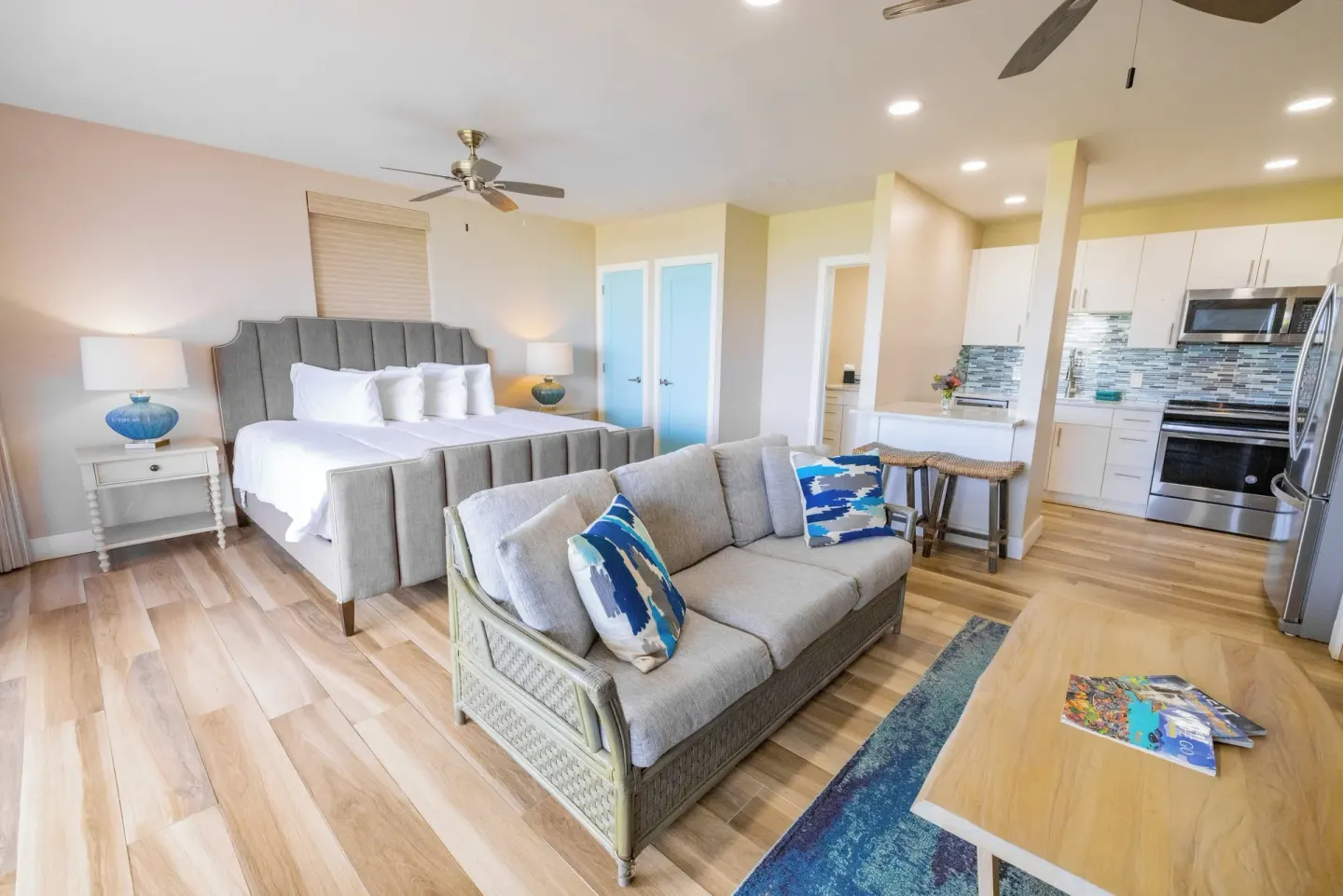 Studio Suite with king bed, sofa and kitchen at Secret Harbour Beach Resort.