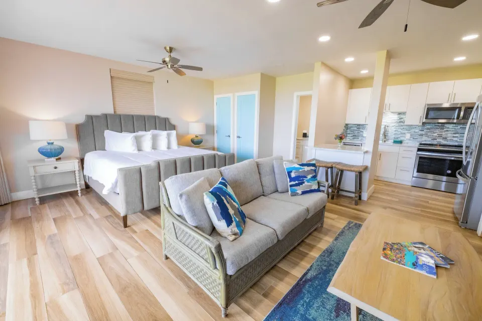 Studio Suite with king bed, sofa and kitchen at Secret Harbour Beach Resort.