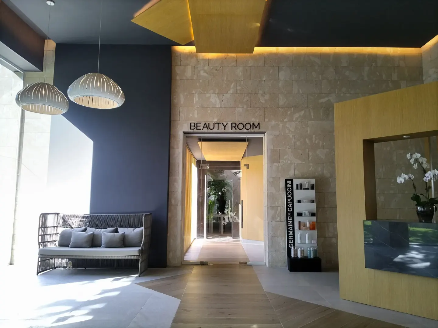 Beauty room entrance and spa seating at Senator Puerto Plata.