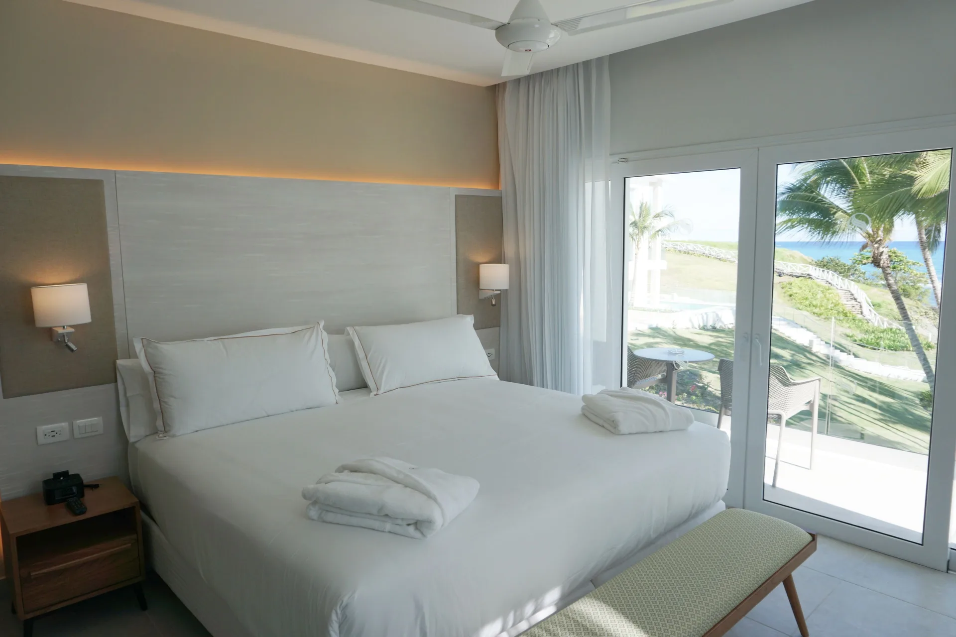 Imperial One Bedroom Suite king bed with balcony ocean view at Senator Puerto Plata.