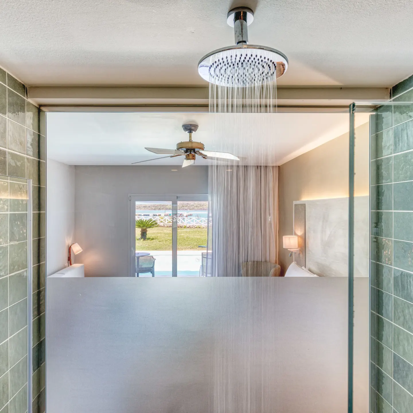 Luxury Junior Suite Ocean View rainfall shower overlooking the bedroom at Senator Puerto Plata.