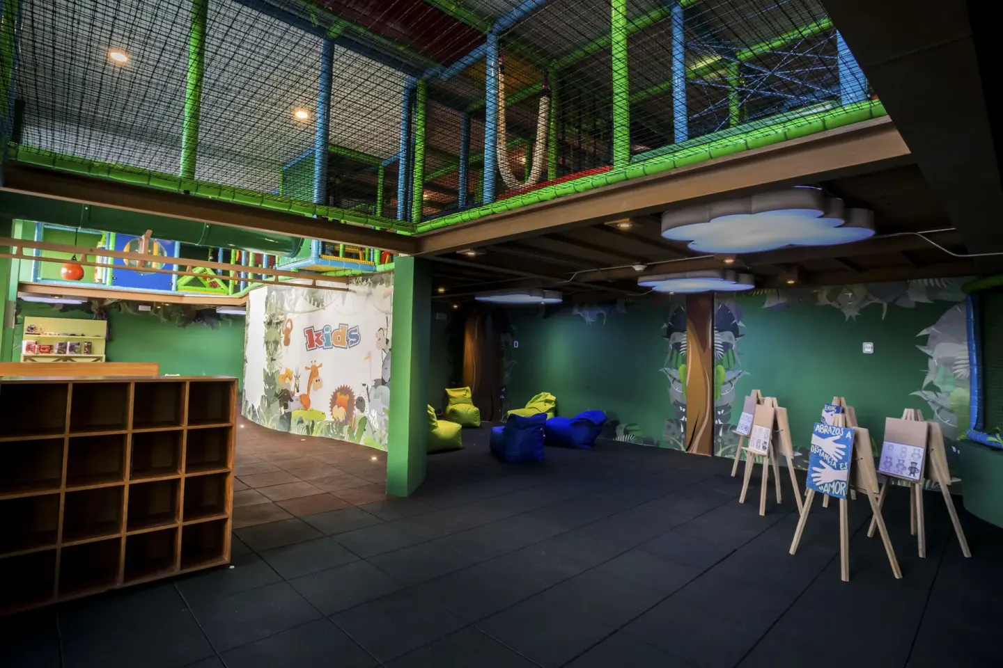 Kids club lounge with netted play structure at Sensira Resort & Spa Riviera Maya.