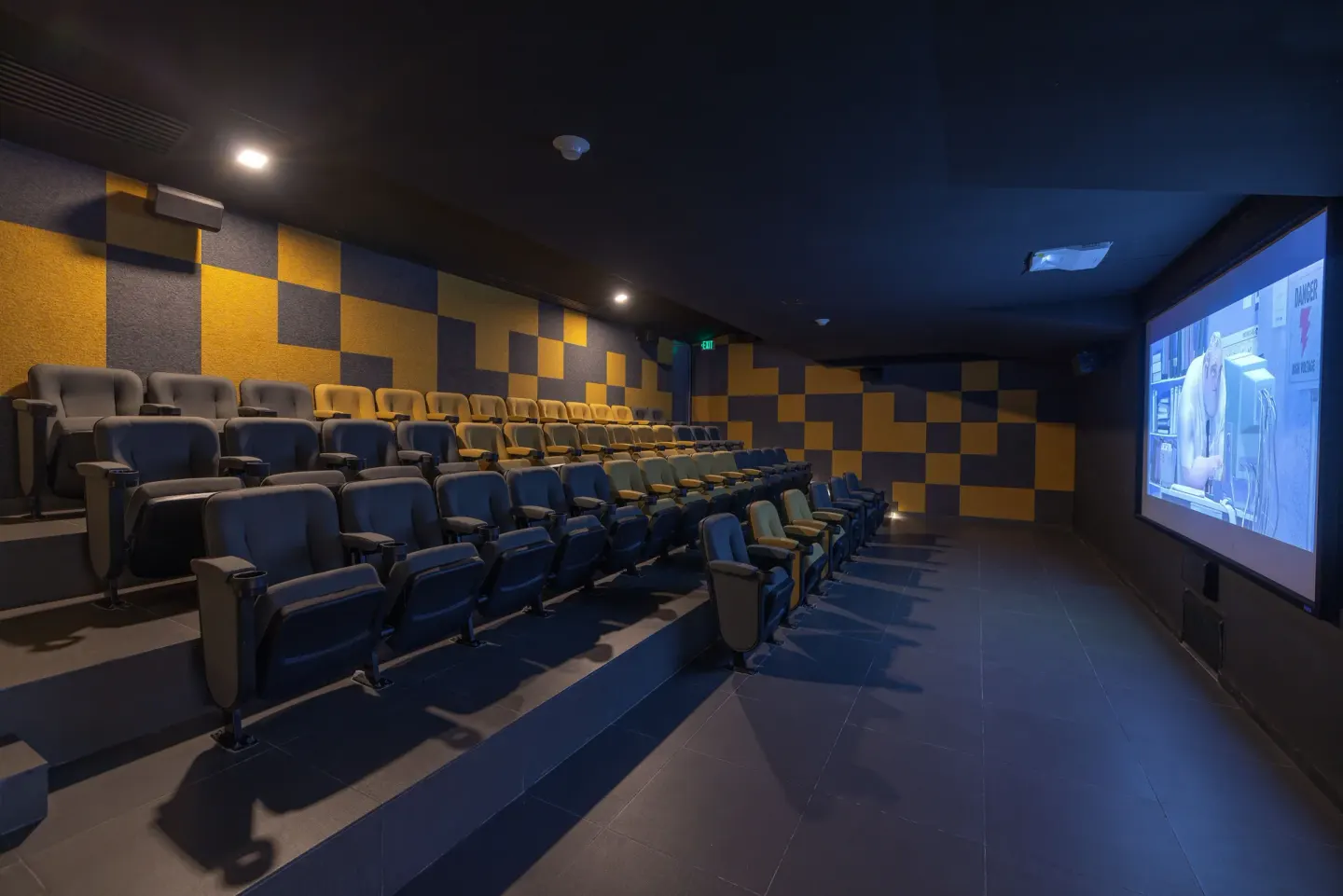 Movie theater with tiered seating at Sensira Resort & Spa Riviera Maya.