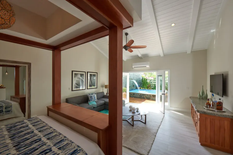 Grande Plunge Pool Butler Suite showing bed, living area and private plunge pool view at Serenity At Coconut Bay