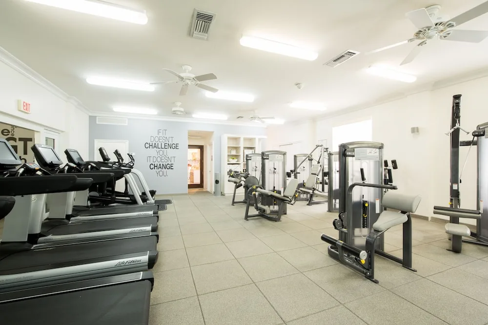 Fitness center with treadmills and weight machines at Seven Stars Resort & Spa.