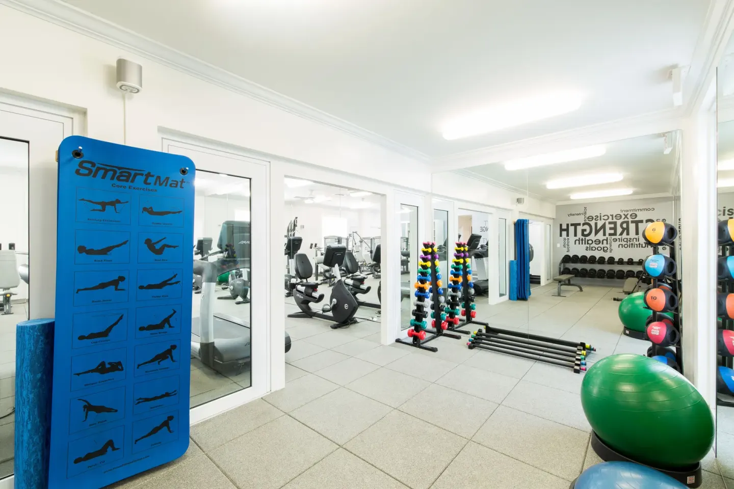 Fitness area with exercise mats, dumbbells, and stability balls at Seven Stars Resort & Spa.
