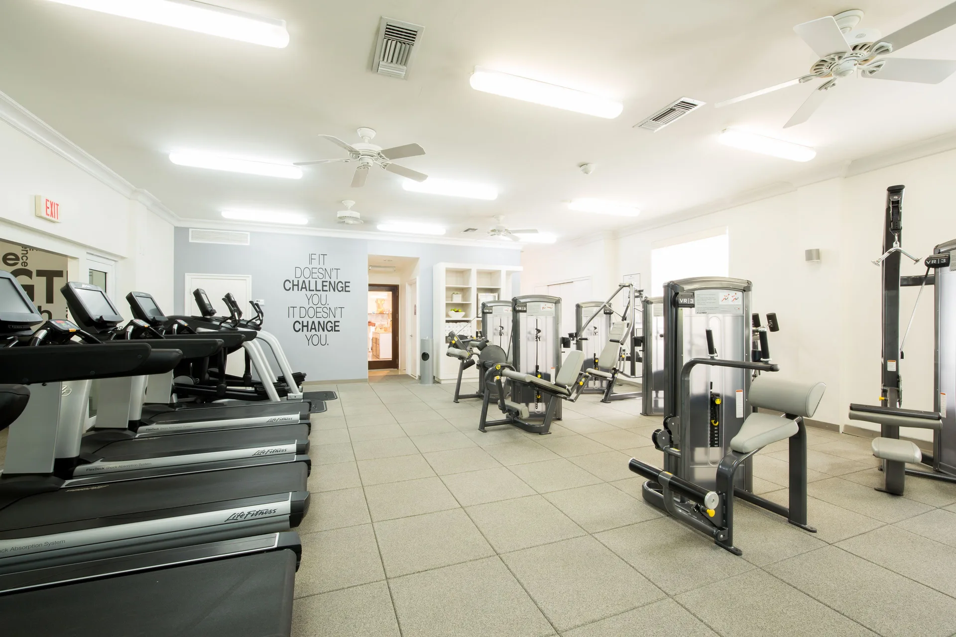 Gym room with treadmills and resistance machines at Seven Stars Resort & Spa.