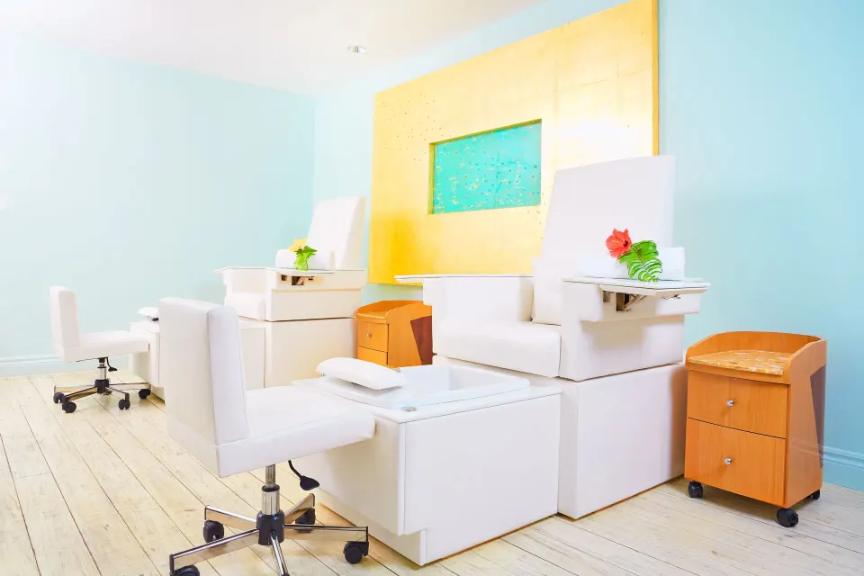 Salon pedicure chairs and manicure stations at Seven Stars Resort & Spa.