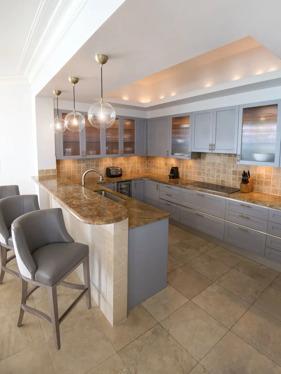 Ocean-view suite kitchen with breakfast bar at Seven Stars Resort & Spa.