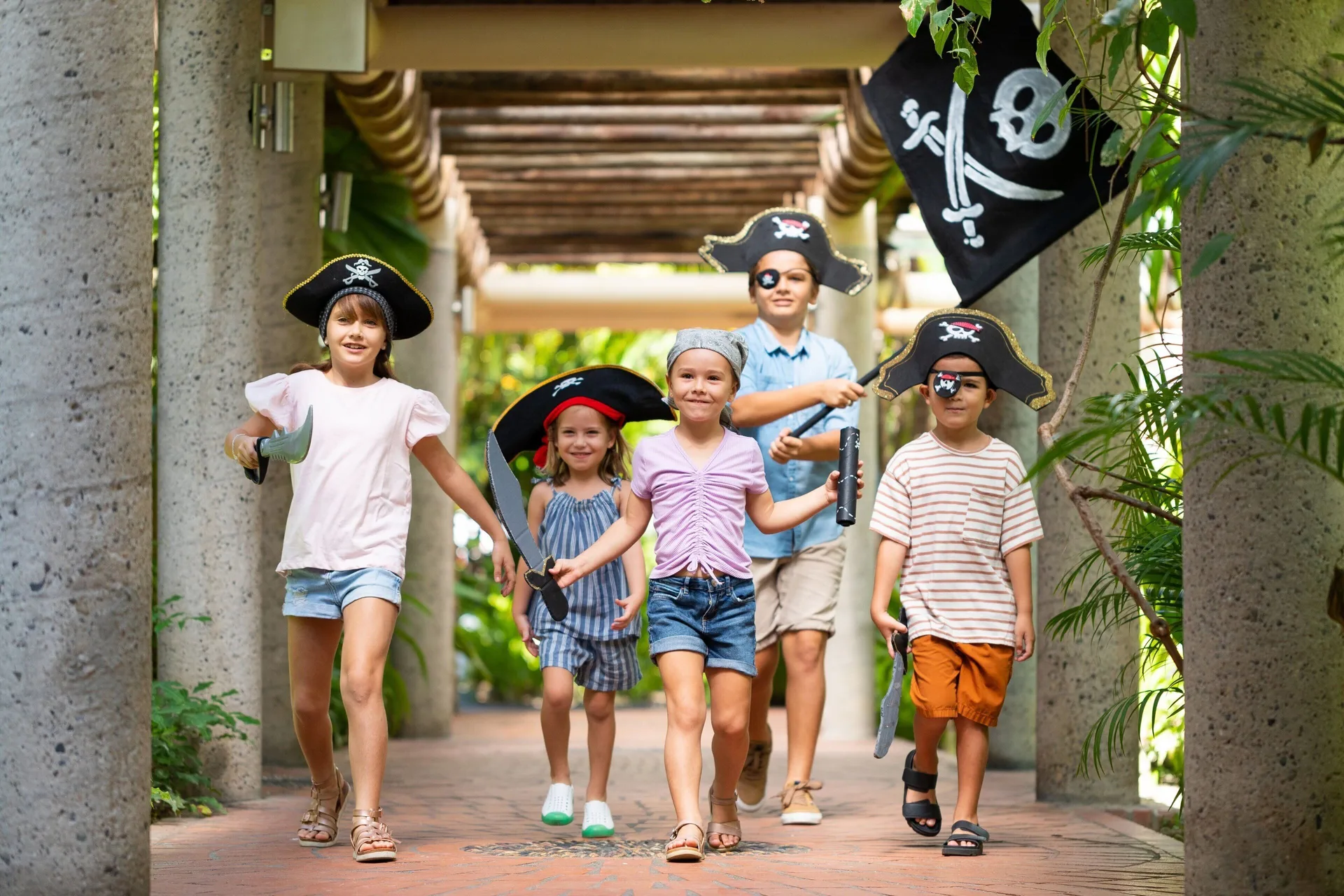 Children in pirate costumes walk through the grounds at Sheraton Buganvilias Puerto Vallarta.