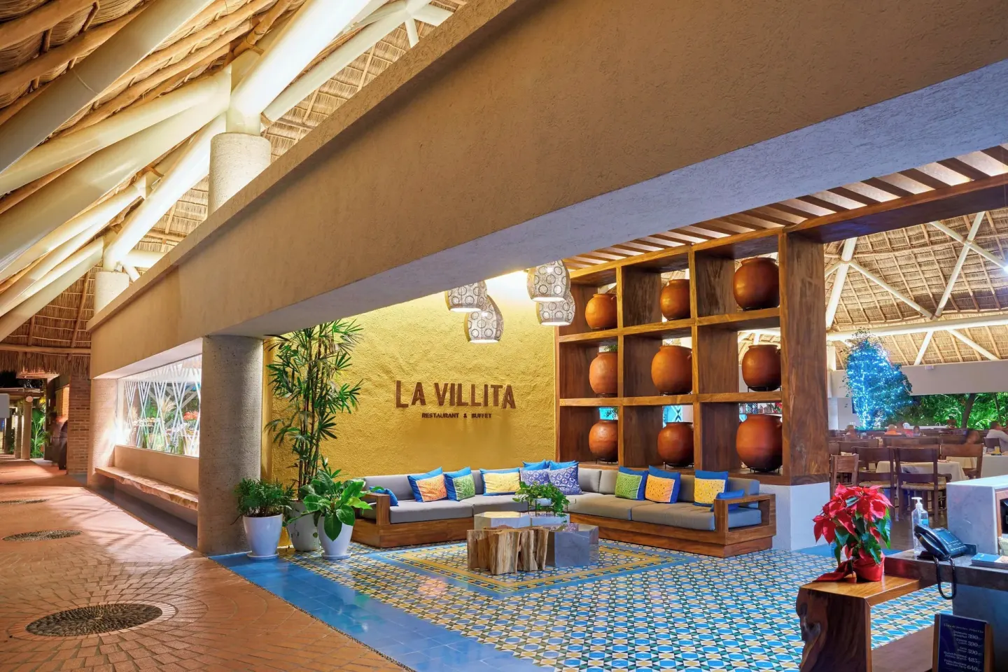 La Villita lounge entrance with tiled floor at Sheraton Buganvilias Puerto Vallarta.