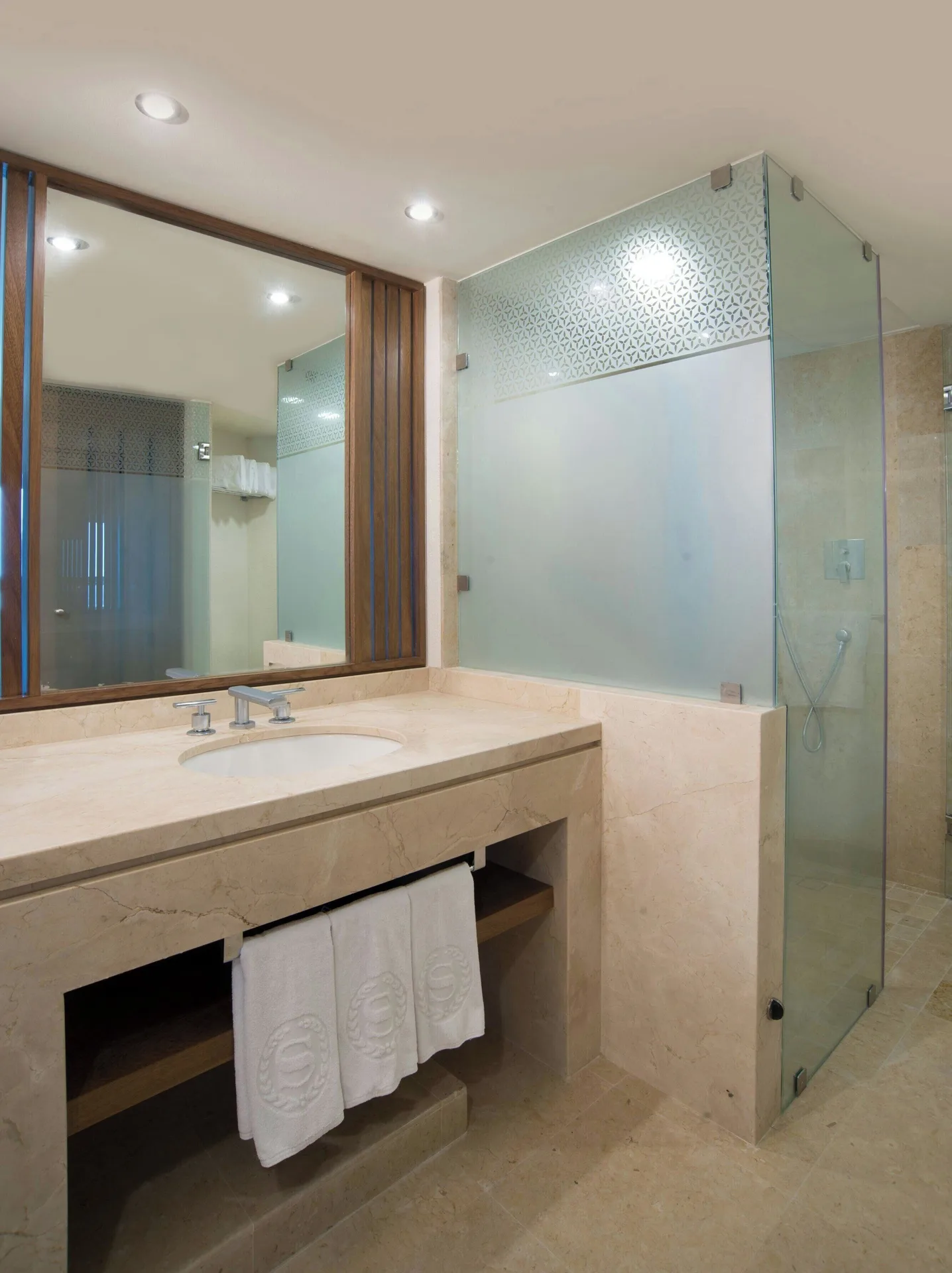 Deluxe Garden View bathroom sink and shower at Sheraton Buganvilias Puerto Vallarta.