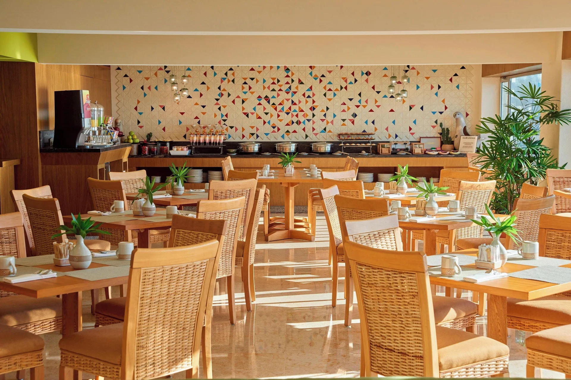Restaurant dining room with buffet tables at Sheraton Buganvilias Puerto Vallarta.
