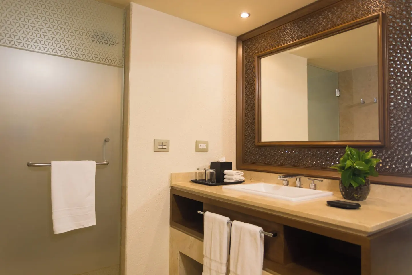 Signature Room bathroom vanity and shower at Sheraton Buganvilias Puerto Vallarta.