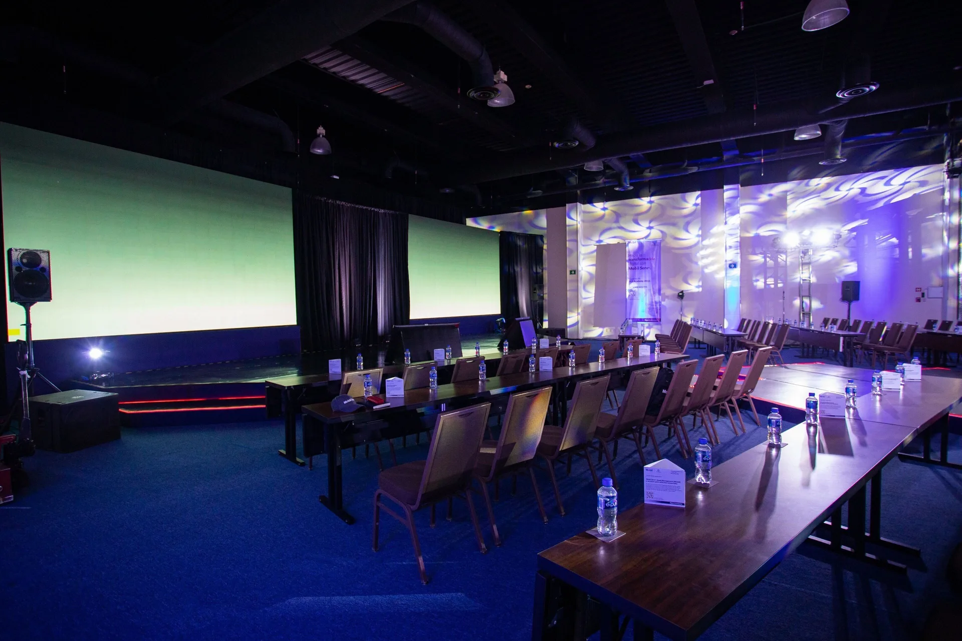Conference room with projection screens and classroom seating at Sheraton Buganvilias Puerto Vallarta.