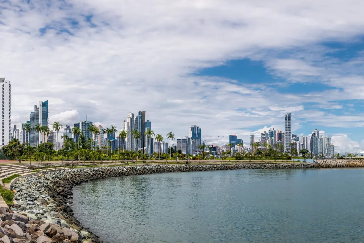 Bayfront skyline and rocky shoreline near Sheraton Grand Panama.