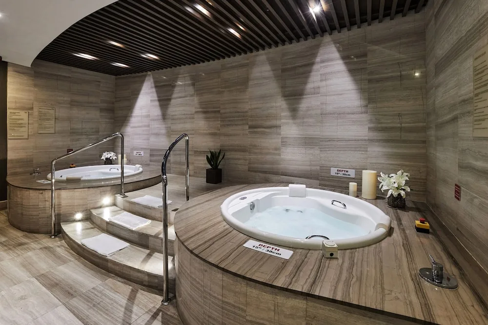 Indoor whirlpool tubs with tiled surrounds at Sheraton Grand Panama.