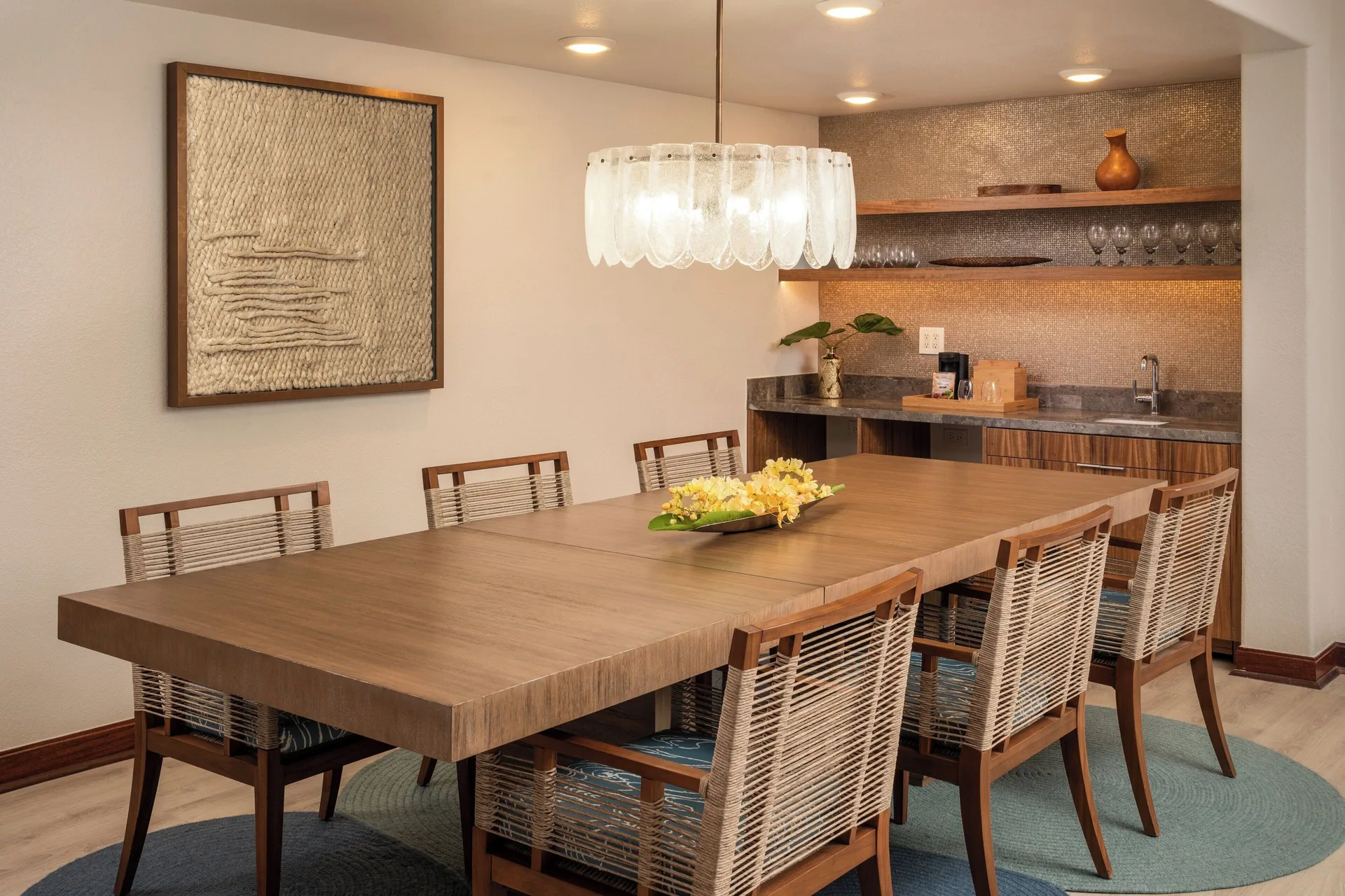 Dining table and wet bar in a suite at Sheraton Kauai Coconut Beach Resort.