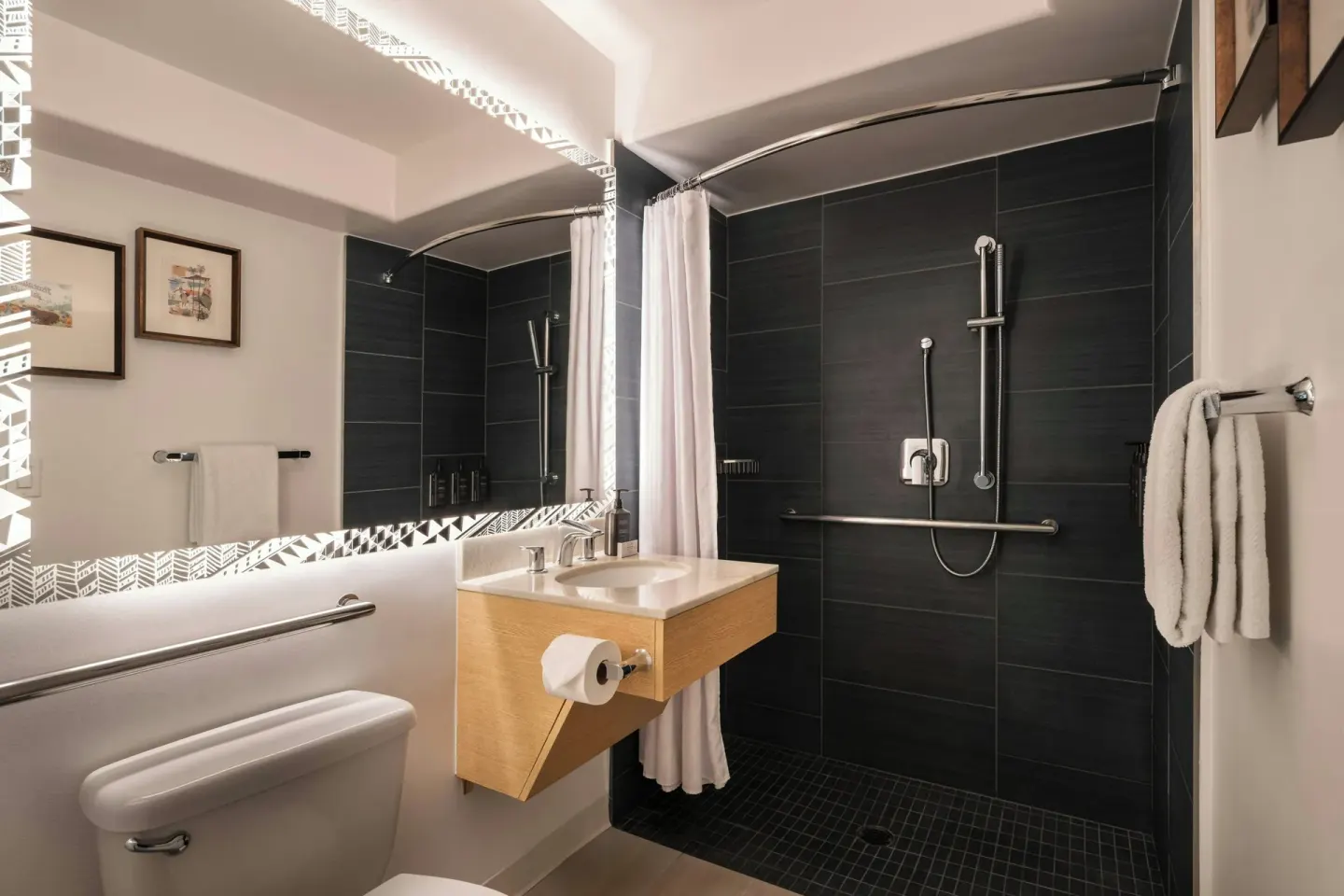 Accessible bathroom with roll-in shower at Sheraton Kauai Coconut Beach Resort.
