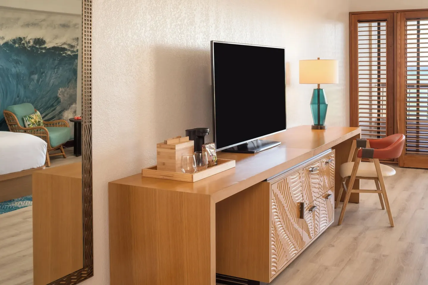 Standard room media console and desk area at Sheraton Kauai Coconut Beach Resort.