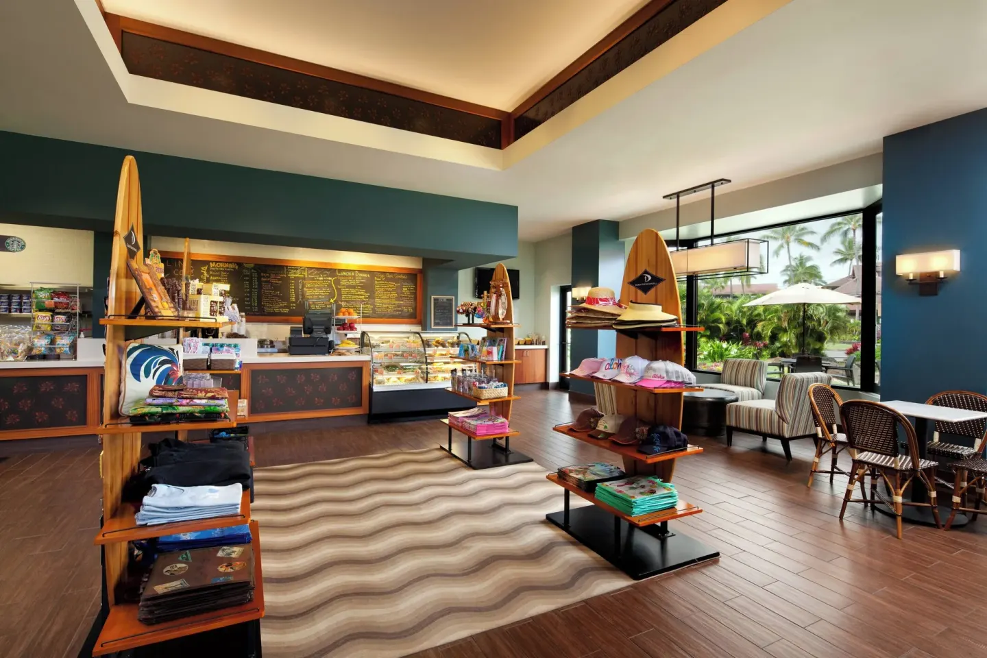Resort market with apparel displays and counter seating at Sheraton Kauai Resort.