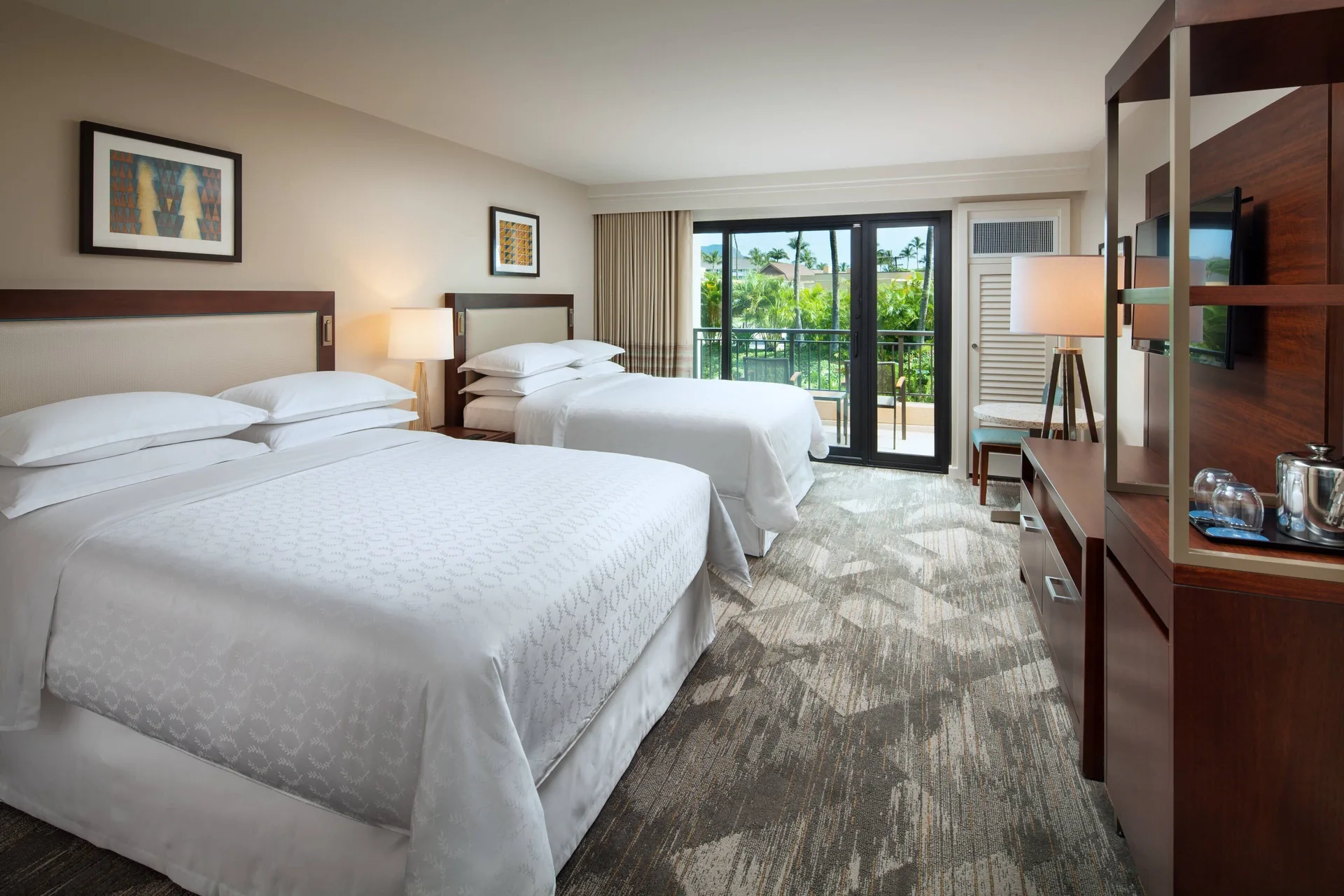 Deluxe Room Garden View with two beds and balcony at Sheraton Kauai Resort.