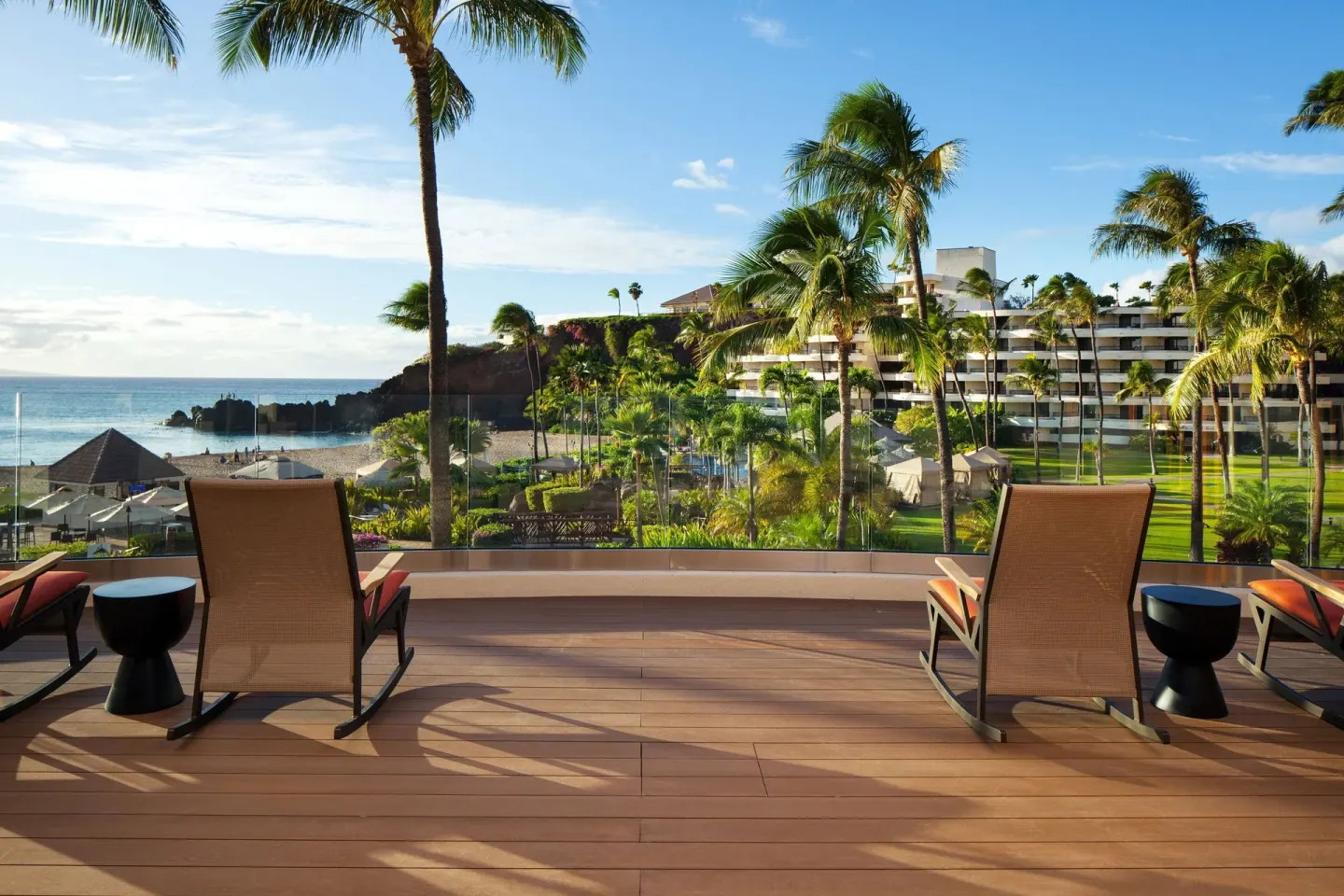 Ocean-view terrace with lounge chairs at Sheraton Maui Resort & Spa.