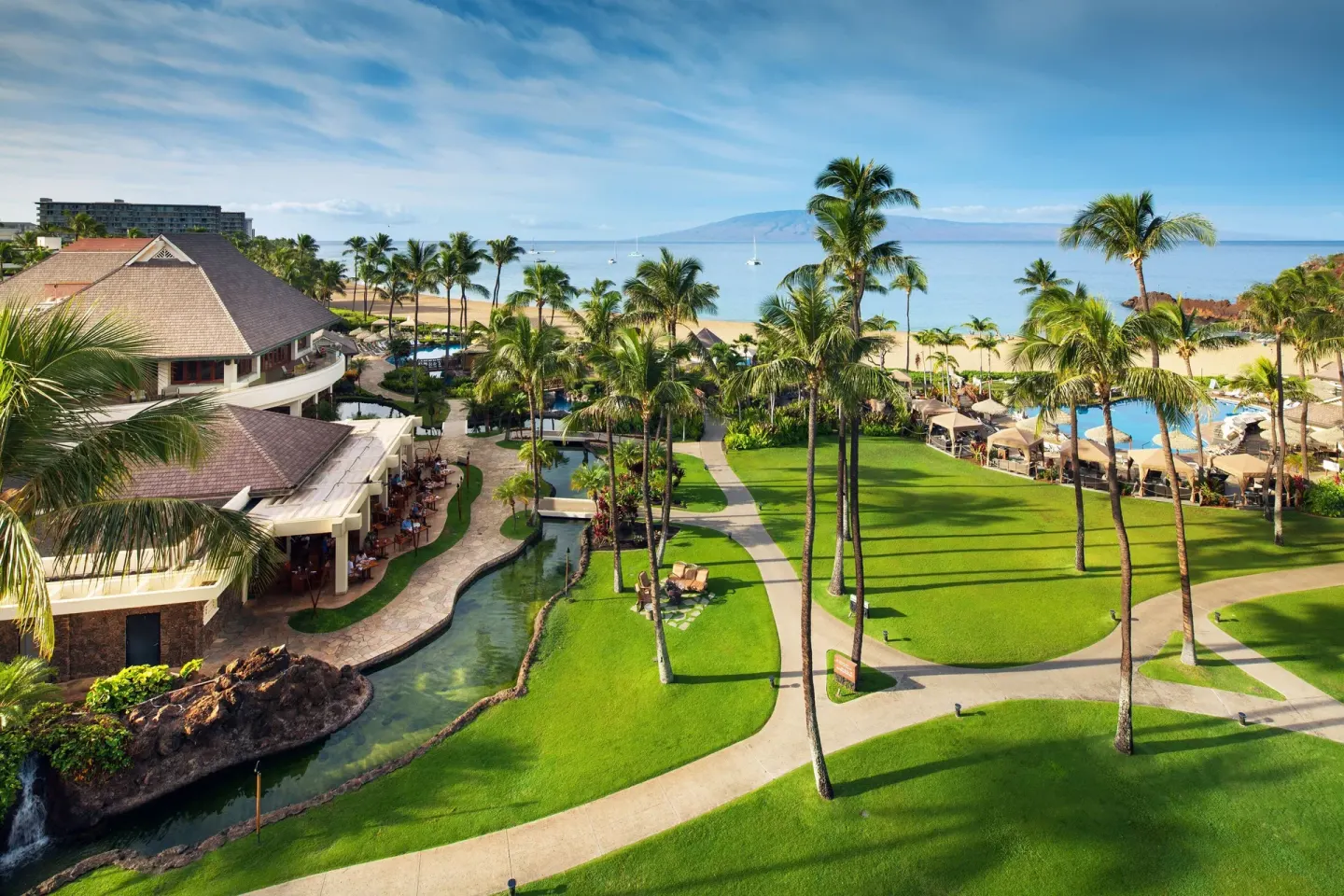 Palm lawns, lagoon, pool and beach views at Sheraton Maui Resort & Spa.
