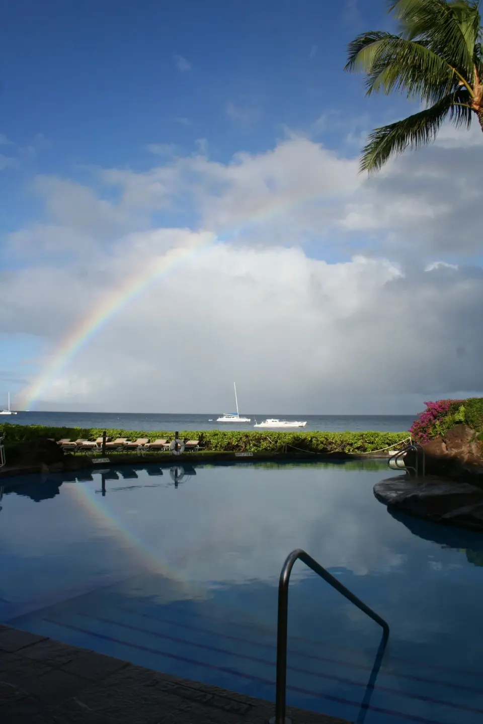 Rainbow over the ocean and pool at Sheraton Maui Resort & Spa.
