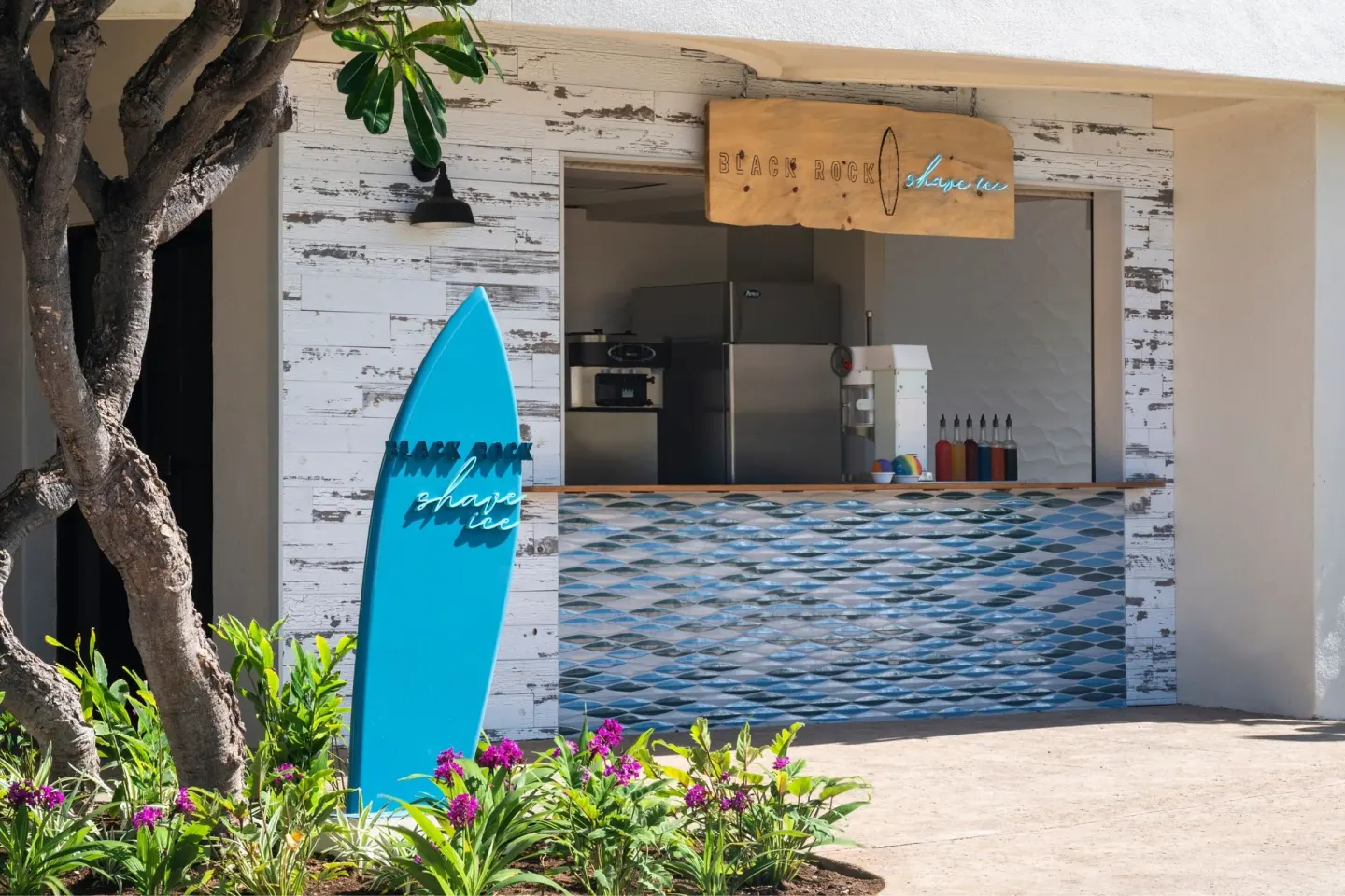 Black Rock Shave Ice stand with surfboard sign at Sheraton Maui Resort & Spa.