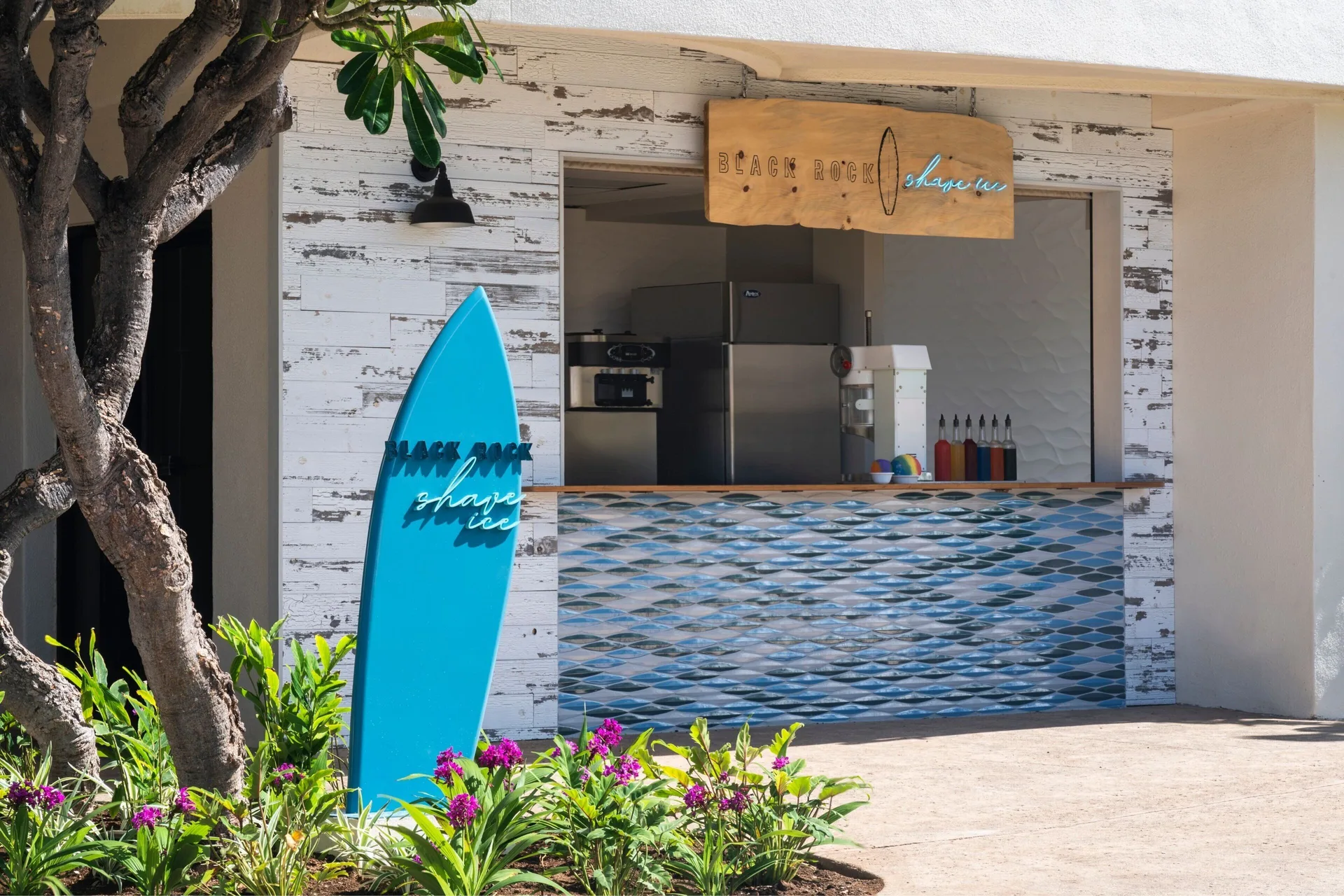 Black Rock Shave Ice stand with surfboard sign at Sheraton Maui Resort & Spa.