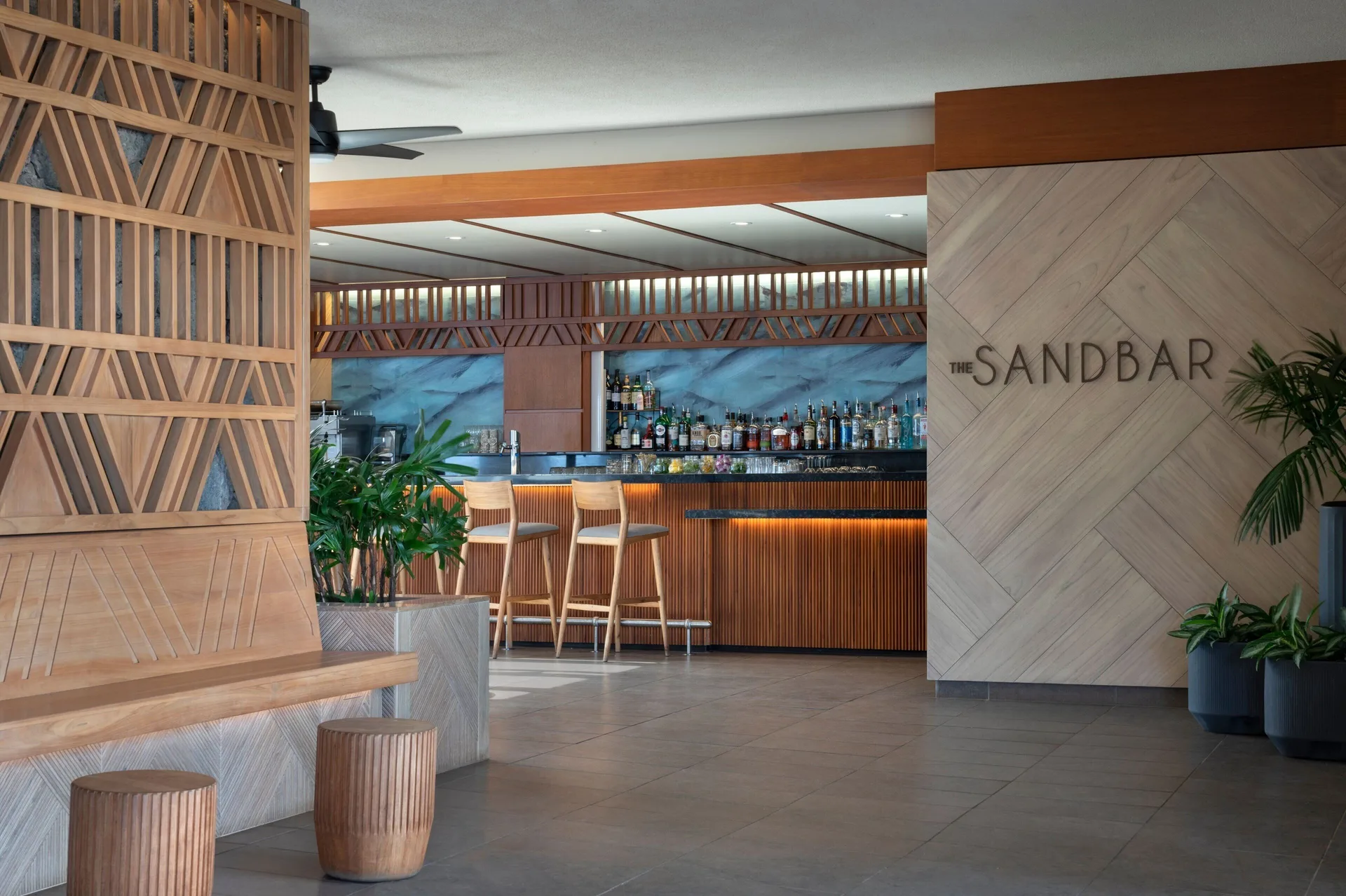 The Sandbar bar entrance with seating and a back bar at Sheraton Maui Resort & Spa.