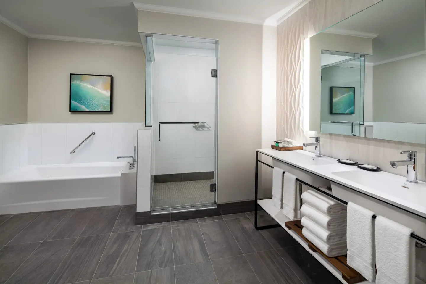 Deluxe Suite oceanfront bathroom with tub, shower and double vanity at Sheraton Maui Resort & Spa.