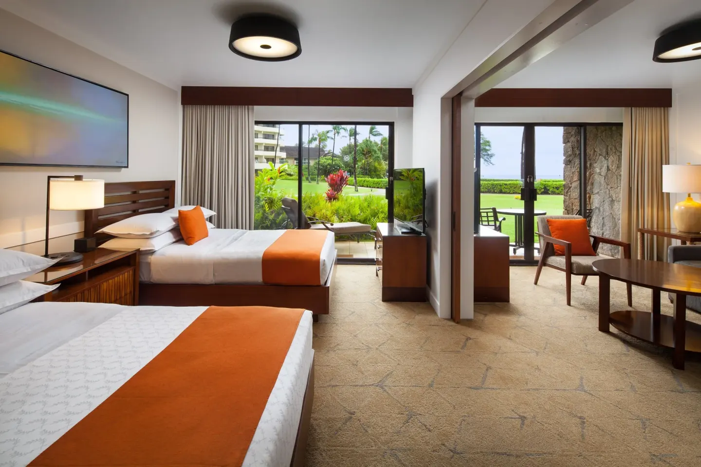 Ohana Suite ocean view two-bed room and sitting area at Sheraton Maui Resort & Spa.