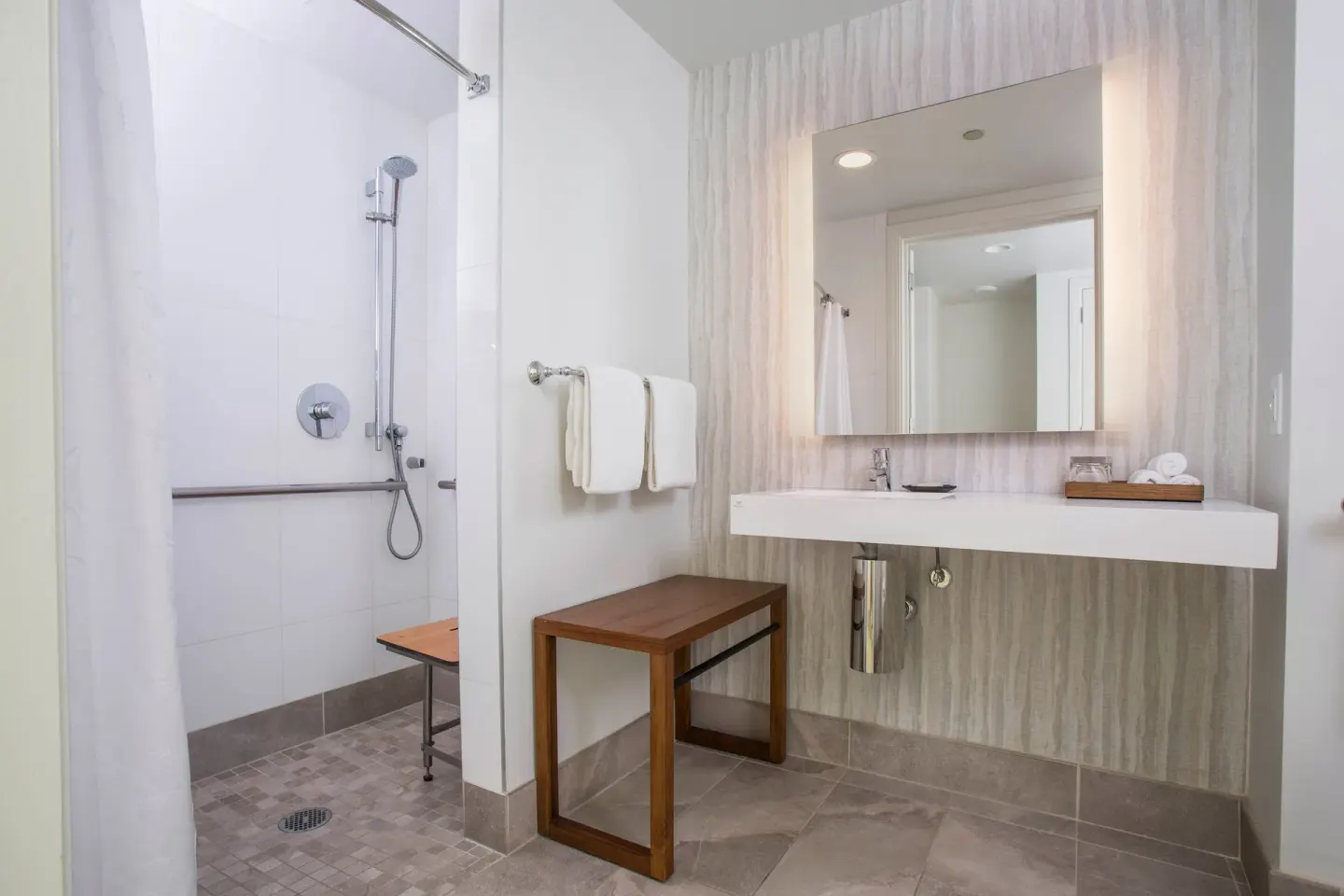 Bathroom vanity and roll-in shower area at Sheraton Maui Resort & Spa.